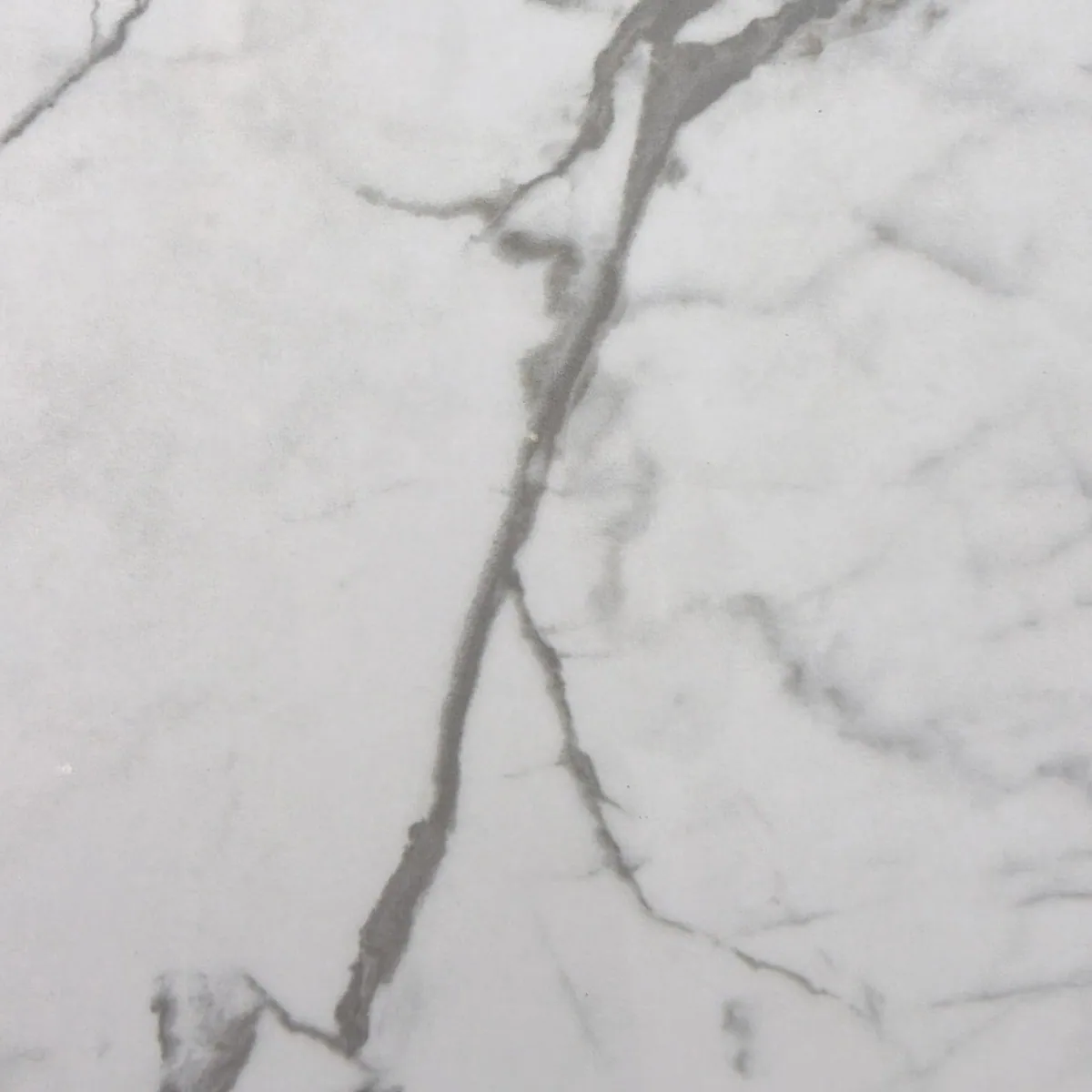 Muestra de Statuario (pulido) — Porcelanato de cuerpo coloreado